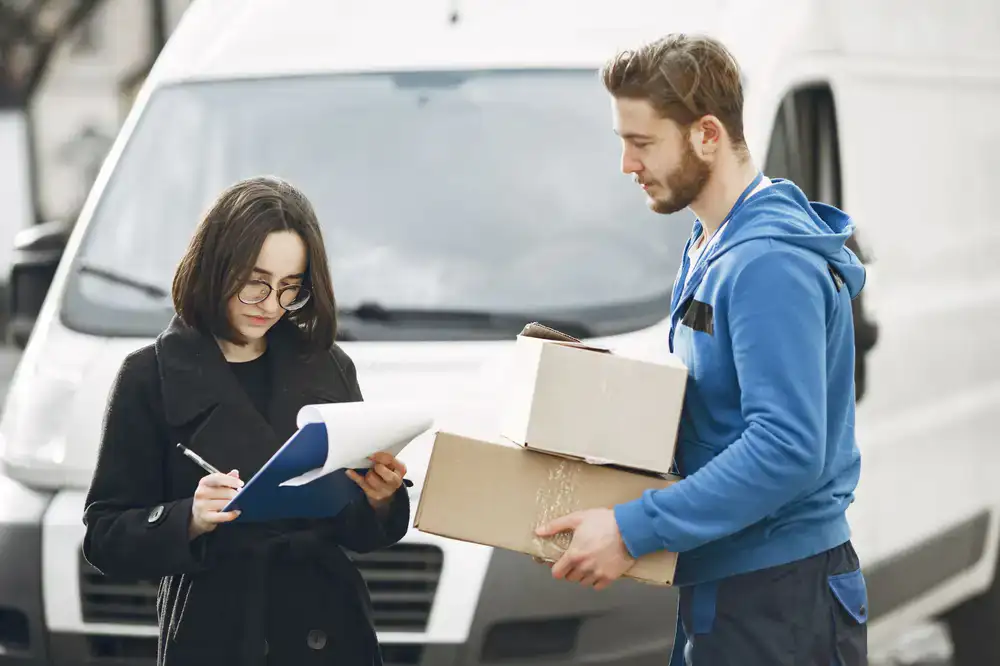 Courier handing over business documents