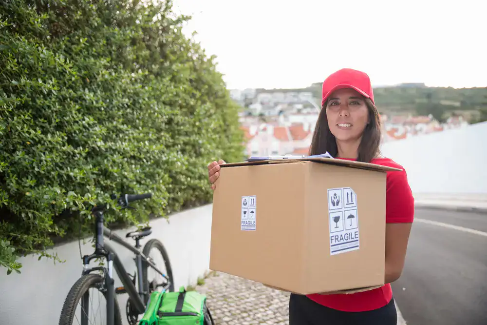 Courier securing a package in their bag